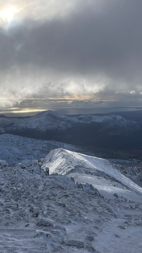 The sun smiling on the Rhyd Ddu path